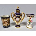 A Royal Vienna porcelain beaker painted with a portrait of a young lady, to a blue ground with