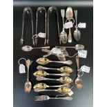 Three pairs of 19th century silver sugar tongs and a quantity of silver teaspoons, 14.61ozt