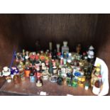 A good collection of assorted miniature spirits comprising Johnnie Walker Black Label, Remy Martin