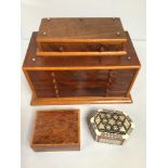 A miniature walnut veneered tabletop collector's cabinet with attached top smaller drawer above five