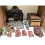 SECTION 23. Various Oriental hardwood carved masks together with some Chinese reverse painted