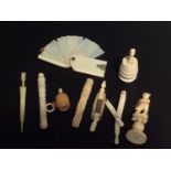 Three various 19th century carved ivory needle cases, tape measure with Southsea 'Stanhope,'