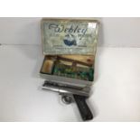 A Webley Senior 'Mark I' .177 air pistol, in original box, with feathered darts etc.