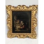A 19th century continental school study of an interior scene, depicting an elderly couple sat at a