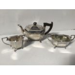A three-piece silver tea set by Viner's Ltd, of octagonal form, comprising teapot, two-handled sugar