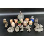 A pewter penguin glass scent bottle holder, together with some Royal Selangor pewter animals and