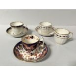 A Derby porcelain trio with gilt and blue bands, tea cup and saucer gilt blue bands (puce marks),