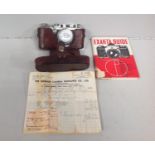 A Leica 3a camera no. 309916 fitted with a Summar 50mm F2 lens no. 376099 with original receipt from