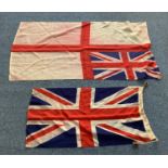 A Royal Navy Ensign flag 130x 89cm together with a Union Jack 90 47cm
