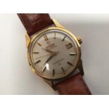 A gents 18ct gold Omega Constellation automatic wristwatch c.1963, the silvered dial with applied