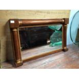 A rosewood wall/over-mantle mirror, of rectangular form, the frame with vertical and horizontal