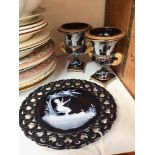 SECTION 26. A pair of black pottery campagna vases and pierced plate with Mary Gregory style