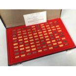 A Franklin Mint cased set of 100 miniature 24ct gold-plate over .925 silver ingots, 'The World's