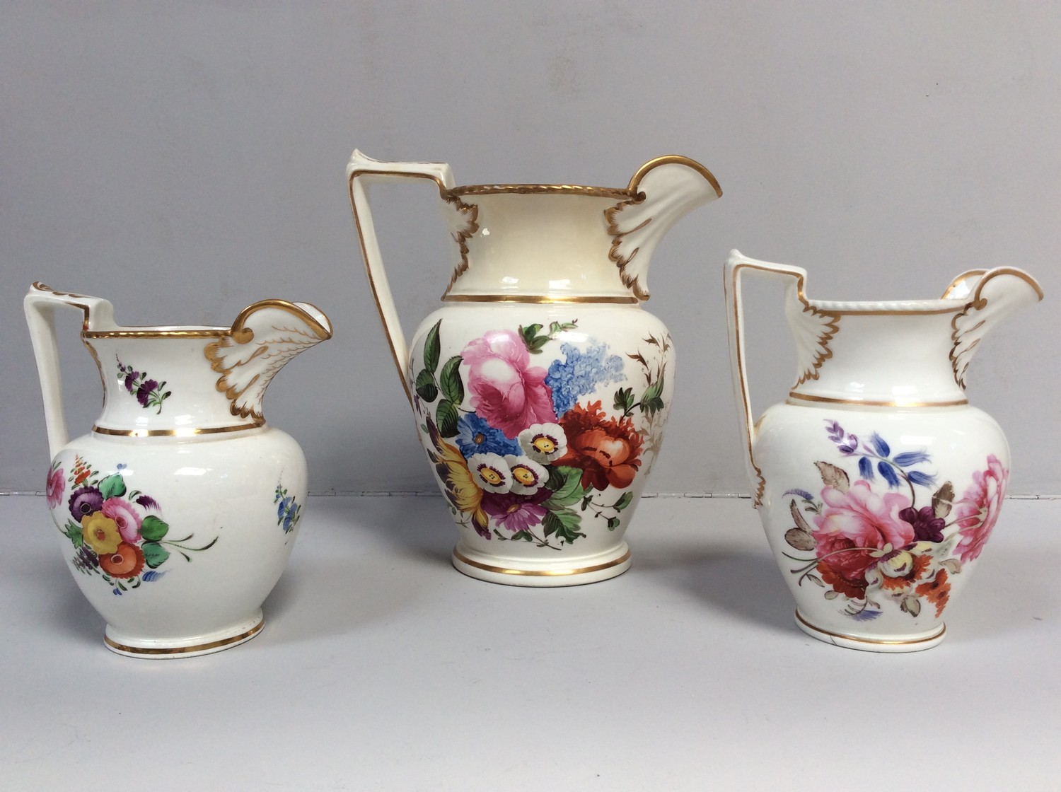 Three various early 19th century English porcelain jugs, probably Staffordshire, with ovoid body and - Image 2 of 3