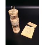 An early 20th century Japanese Ivory cricket cage, of cylindrical form with two separate cages and