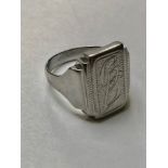 A white metal (tests as 18ct gold) signet ring, the rectangular top engraved with initials 'CB',