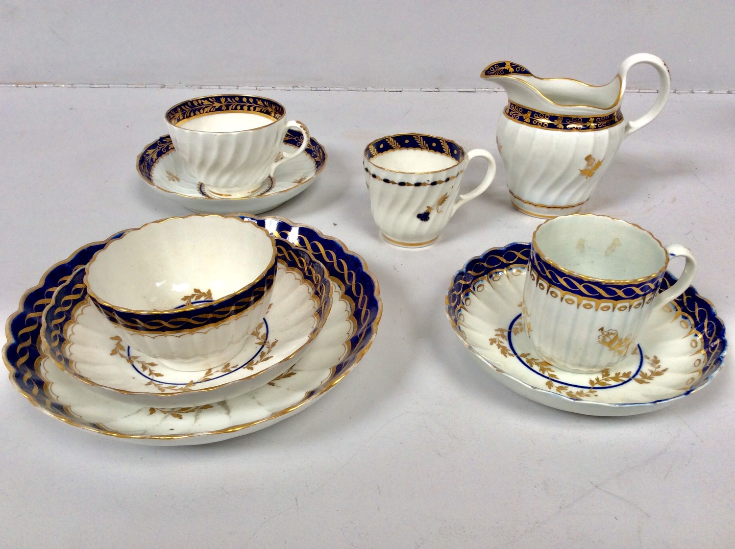 A small collection of first period Worcester porcelain including a spiral tea cup & saucer,
