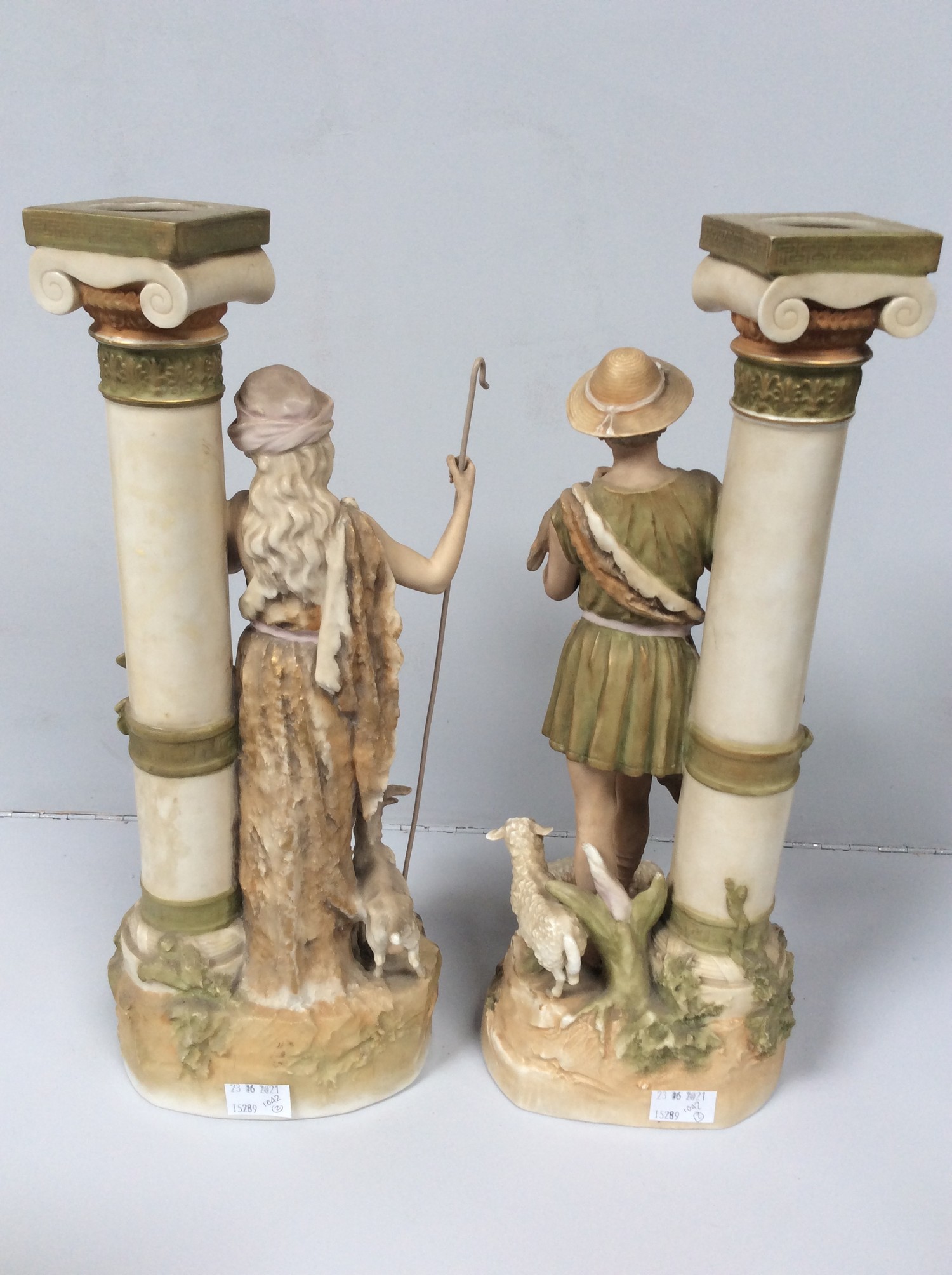 A pair of Royal Dux porcelain figures of a shepherd and shepherdess modelled next to classical Ionic - Image 3 of 5