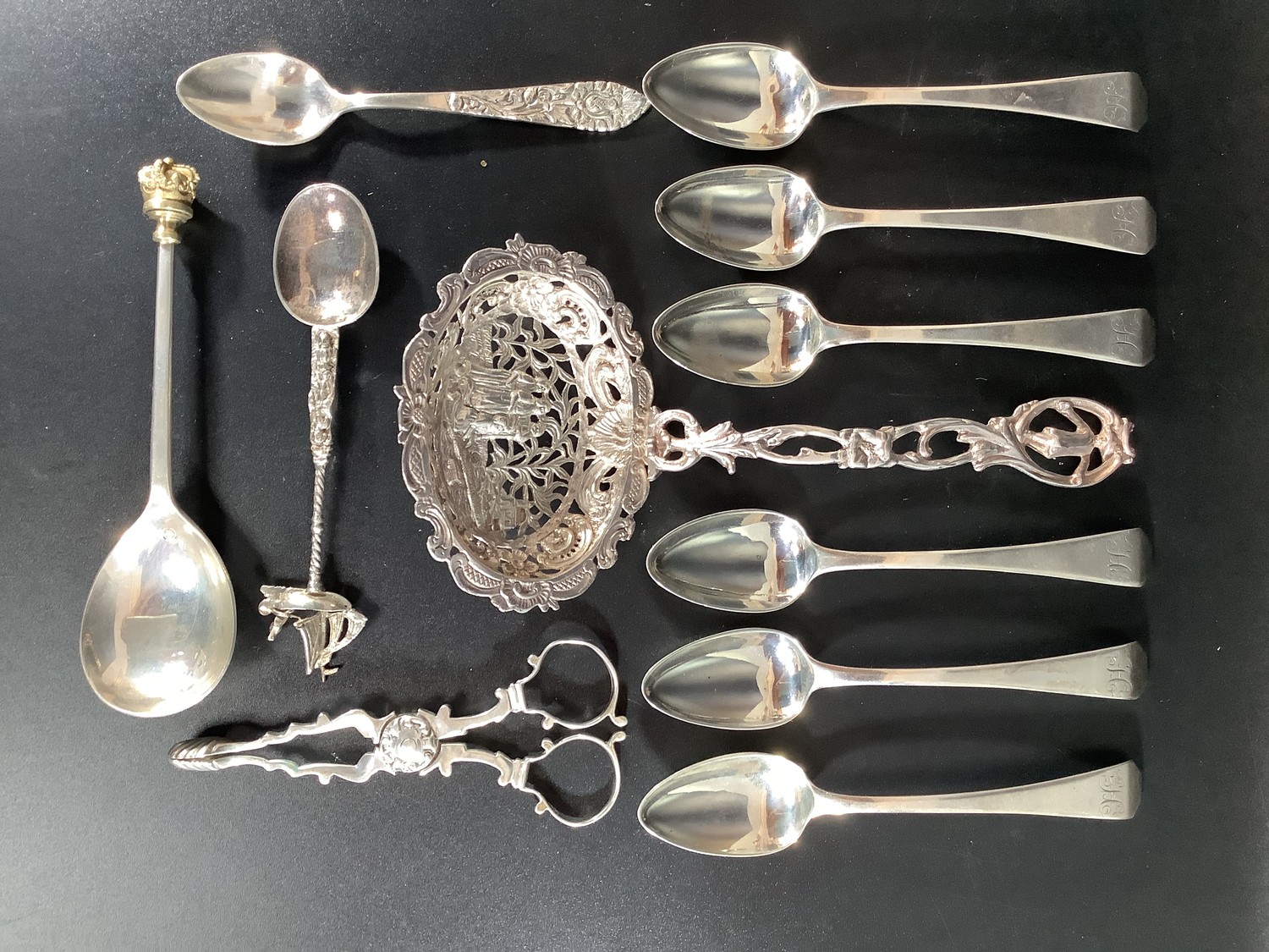 A set of six Georgian silver teaspoons, maker's initials 'TW', monogramed 'H' to the finials,