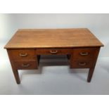 A Boots systems pedestal desk in oak with 2 drawers either side, a drawer centre and a green