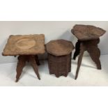 Three various Indian carved wood occasional tables including one with the top carved with a dragon