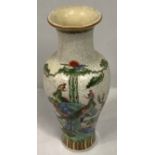 A 20th century Chinese crackle glaze vase, of baluster form, decorated in polychrome enamels with
