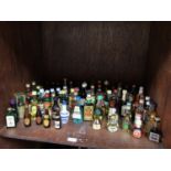 A good collection of assorted miniature spirits, lagers and liquors comprising Jagermeister,