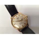 A gents gold-plated Longines Conquest Calender Automatic wristwatch, the silvered dial with