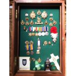 A small collection of modern re-issue Royal Marine and military cap badges, reproduction WW1 & WW2