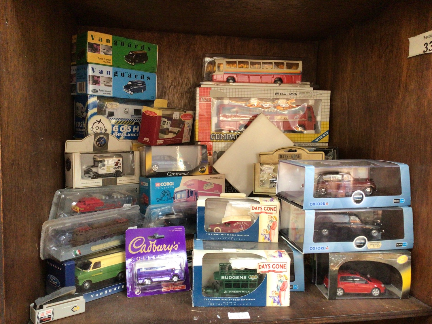 SECTIONS 33 & 34. A collection of approximately 35 boxed die-cast vehicles comprising Lledo Days