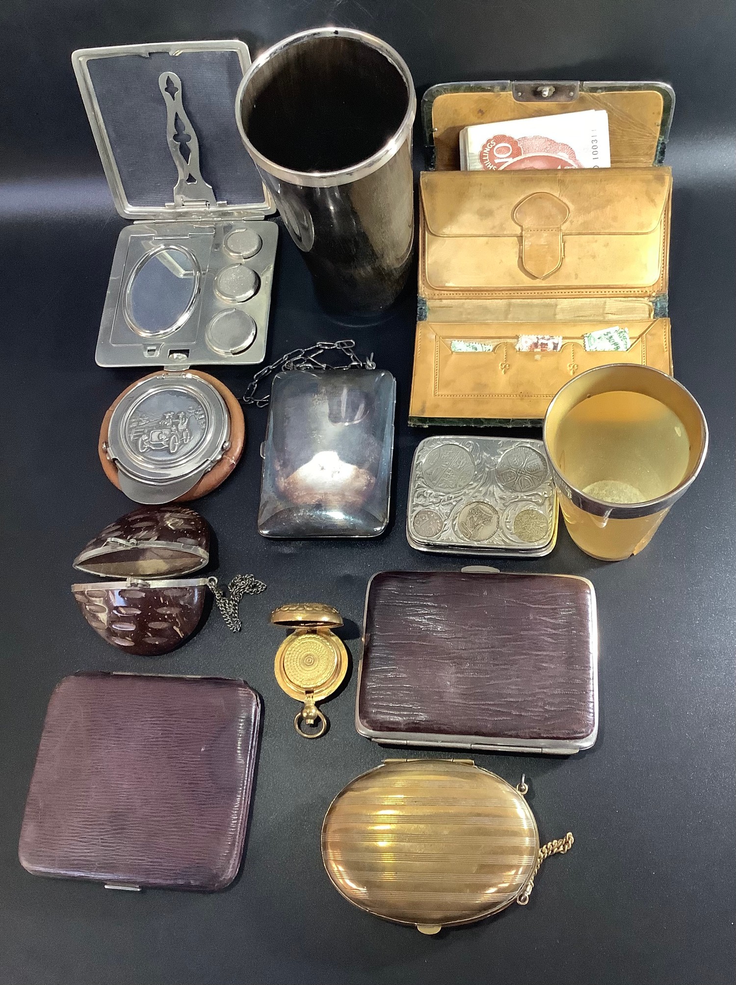 Two various leather and silver mounted wallets, together with other coin holders and wallets and two