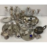 A good collection of assorted silver-plated wares comprising trays, a large bowl, teapots,