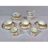 An 18th century Worcester porcelain part tea service decorated with blue and gilt sprigs, to