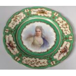 A mid-19th century Sevres porcelain cabinet plate, painted to the centre with a half-length portrait