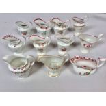 Eleven various 18th century New Hall porcelain cream jugs, with polychrome enamel decoration, (11)