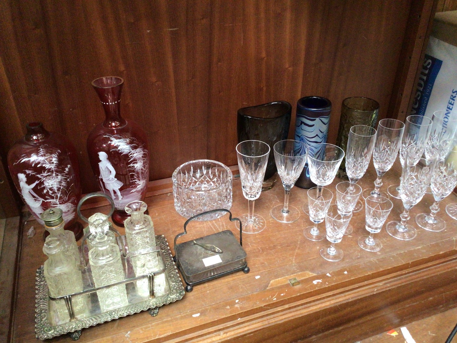 A collection of assorted glassware comprising two Mary Gregory style ovoid vases, an iridescent vase
