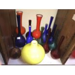 SECTION 28. Fifteen various coloured glass and coloured overlay glass bottles / vases