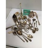 A collection of assorted silver-plated wares comprising trays, serving dishes, various flatware,