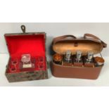 A domed top liquor set with small decanter and four shot glasses, together with a leather cased