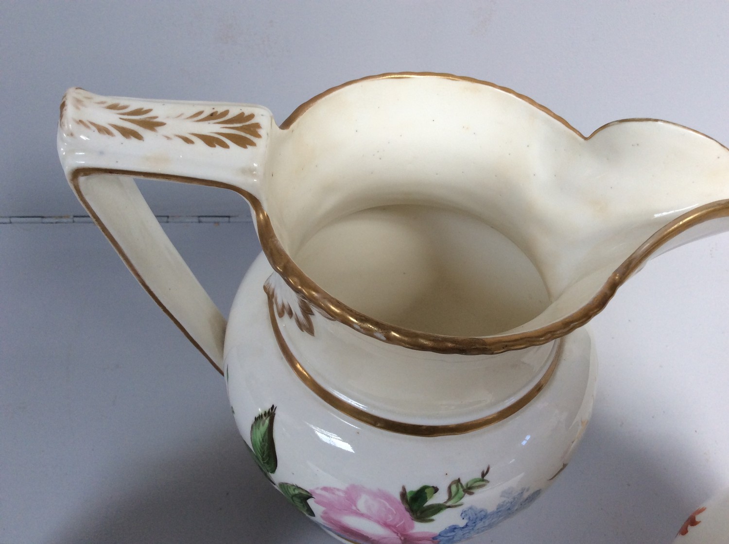 Three various early 19th century English porcelain jugs, probably Staffordshire, with ovoid body and - Image 3 of 3