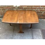 An Ercol dark elm Sutherland table, 68cm