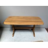 A vintage Ercol 'style refectory ash table together with 8 Ercol Windsor Quaker dining chairs