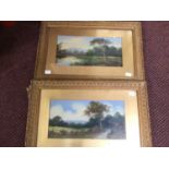 Two country landscape studies with trees by a riverbank and mountainous landscapes beyond, unsigned,