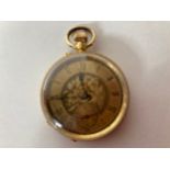An 18ct gold cased open-faced pocket watch, the decorative, gilt foliate dial with Roman numerals