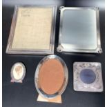 Two various rectangular silver photograph frames, an Art Nouveau frame and two various oval silver