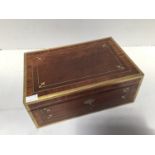 A regency brass-bound rosewood writing slope, with brass inlaid decoration and flushed brass