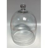 A large glass dome with globular finial, approx. 40cm high