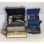 Two various Buffet Crampon B12 clarinets with spare reeds and cork grease, in fitted and lined