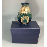 A Moorcroft pottery vase of baluster form decorated in the 'Golden Destiny' pattern after Rachel