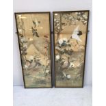 A pair of Japanese silk and silver bullion thread panels, each painted and woven with scenes of